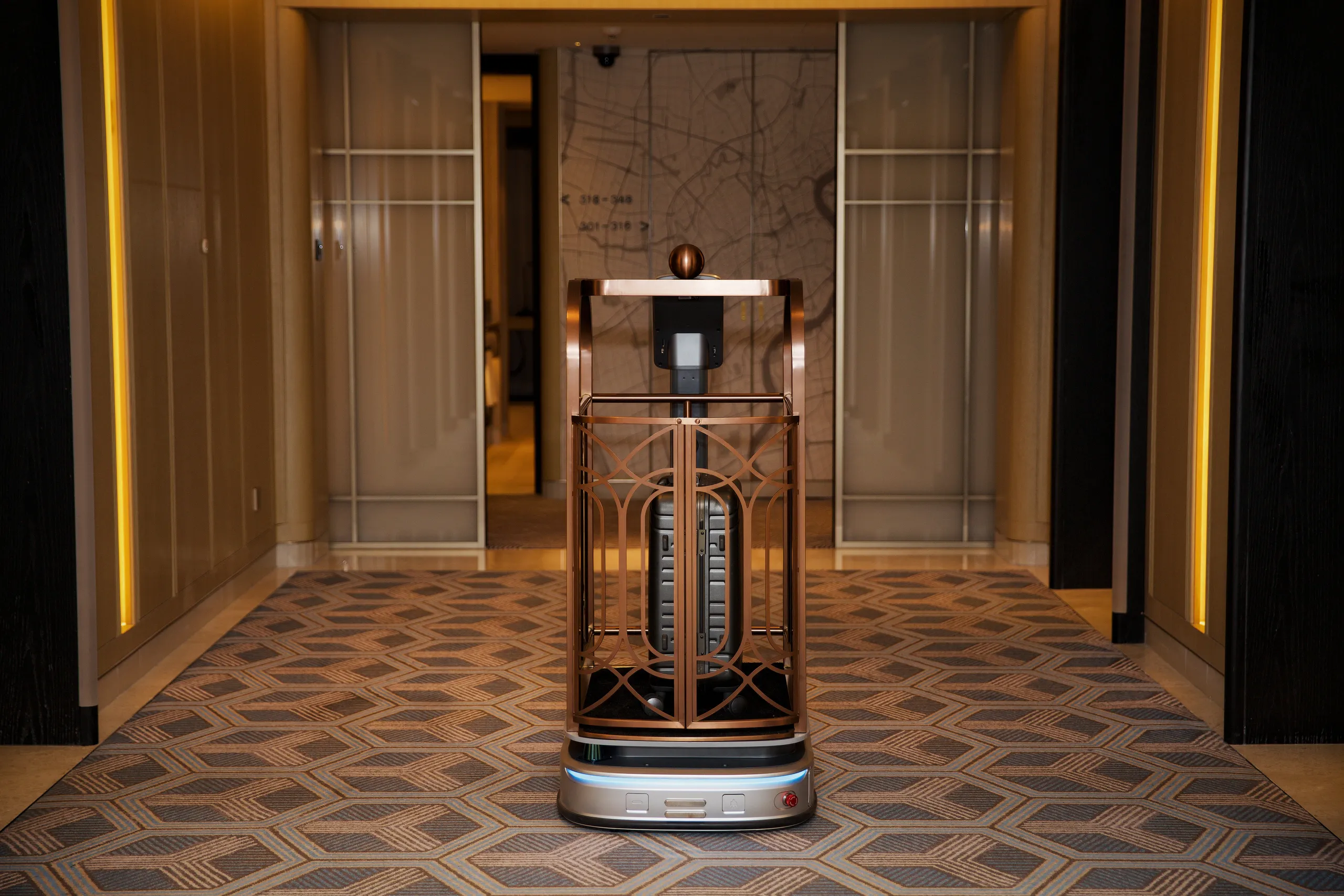 Smart luggage carrier in a hotel corridor